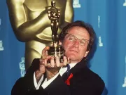 Robin Williams přebírá Oscara