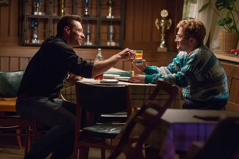 Taron Egerton, Hugh Jackman