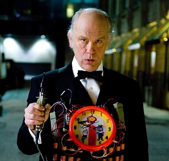 John Malkovich v roli "prasáka" Harveyho Weinsteina