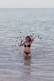 Hot Beach Babe Aims to Please