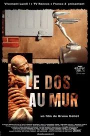 Dos au mur, Le